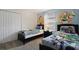 Toy Story themed bedroom with twin beds and a dresser at 830 Pebble Beach Dr, Davenport, FL 33896