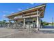 Outdoor snack bar with tables and seating at 830 Pebble Beach Dr, Davenport, FL 33896