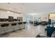 Modern kitchen with stainless steel appliances and an island with seating at 830 Pebble Beach Dr, Davenport, FL 33896