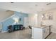 Modern kitchen with an island, stainless steel appliances and white cabinets at 830 Pebble Beach Dr, Davenport, FL 33896