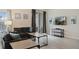 Comfortable living room with gray sofa and access to a patio at 830 Pebble Beach Dr, Davenport, FL 33896