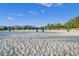 Beach volleyball court with nets and sand at 830 Pebble Beach Dr, Davenport, FL 33896
