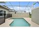 Private screened pool with patio area at 830 Pebble Beach Dr, Davenport, FL 33896