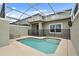 Private screened pool and patio perfect for relaxing at 830 Pebble Beach Dr, Davenport, FL 33896