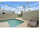 Relax in your private, screened pool area at 830 Pebble Beach Dr, Davenport, FL 33896