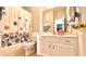 Clean bathroom with a shower/tub combo, vanity, and toilet at 1133 Indigo Dr, Celebration, FL 34747