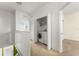 Convenient upper-level laundry closet with washer and dryer at 13228 Daniels Landing Cir, Winter Garden, FL 34787