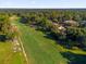 Aerial view of golf course and surrounding neighborhood at 175 Golf Club Dr # 175, Longwood, FL 32779