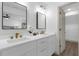 Elegant bathroom with double vanity and a large mirror at 175 Golf Club Dr # 175, Longwood, FL 32779