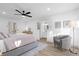 Serene bedroom with access to a bathroom and sitting area at 175 Golf Club Dr # 175, Longwood, FL 32779