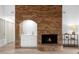 A stunning brick fireplace is the centerpiece of this room, with a built-in wet bar at 175 Golf Club Dr # 175, Longwood, FL 32779