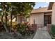 Landscaped entryway with wrought iron gate at 175 Golf Club Dr # 175, Longwood, FL 32779