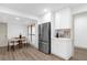 Modern white kitchen with stainless steel appliances at 175 Golf Club Dr # 175, Longwood, FL 32779