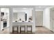 Modern kitchen with white cabinets and breakfast bar at 175 Golf Club Dr # 175, Longwood, FL 32779