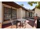 Small patio with wrought iron furniture at 175 Golf Club Dr # 175, Longwood, FL 32779