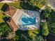 Aerial view of community pool and surrounding landscape at 175 Golf Club Dr # 175, Longwood, FL 32779