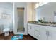 Double vanity bathroom with granite countertop and shower at 3212 Cupid Pl, Kissimmee, FL 34747