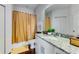 Bathroom boasts granite countertop, white cabinets, and a shower/tub combo at 3212 Cupid Pl, Kissimmee, FL 34747