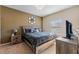 Spacious bedroom with a king-size bed and plenty of natural light at 3212 Cupid Pl, Kissimmee, FL 34747