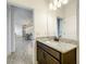 Modern bathroom with granite vanity and walk-in shower at 4408 Renly Ln, Clermont, FL 34711