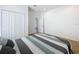 Bedroom with double bed and access to another room at 4408 Renly Ln, Clermont, FL 34711