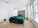 Bedroom with plush bed and large windows at 4408 Renly Ln, Clermont, FL 34711