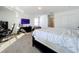 Bedroom with a king-size bed and workspace at 4408 Renly Ln, Clermont, FL 34711