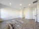 Spacious bonus room with wood-look tile flooring at 4408 Renly Ln, Clermont, FL 34711