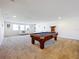 Game room with pool table and comfortable seating at 4408 Renly Ln, Clermont, FL 34711