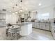 Modern kitchen with stainless steel appliances and an island at 4408 Renly Ln, Clermont, FL 34711