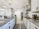 Modern kitchen with stainless steel appliances and an island at 4408 Renly Ln, Clermont, FL 34711