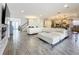Open living room showcasing a spacious layout, plush seating, and fireplace at 4408 Renly Ln, Clermont, FL 34711