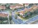 Aerial view of community entrance and townhouses at 7606 Acklins Rd, Kissimmee, FL 34747