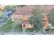 Aerial view of a townhome building showcasing the building's roof and surroundings at 7606 Acklins Rd, Kissimmee, FL 34747