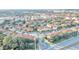 Aerial view of a large townhome community with ample parking and landscaping at 7606 Acklins Rd, Kissimmee, FL 34747