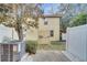 Small backyard with AC unit and access to the kitchen at 7606 Acklins Rd, Kissimmee, FL 34747
