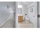 Clean bathroom with toilet and vanity at 7606 Acklins Rd, Kissimmee, FL 34747