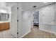 Upstairs bathroom with wood cabinets and tile flooring at 7606 Acklins Rd, Kissimmee, FL 34747