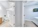 Hallway view of bedroom and bathroom at 7606 Acklins Rd, Kissimmee, FL 34747