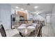 Modern kitchen with stainless steel appliances and light wood cabinets at 7606 Acklins Rd, Kissimmee, FL 34747