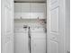 Laundry room with washer and dryer in a closet at 7606 Acklins Rd, Kissimmee, FL 34747