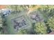 Aerial view of two playgrounds with swings and other play equipment at 7606 Acklins Rd, Kissimmee, FL 34747