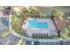 Community pool and patio area with lounge chairs at 7606 Acklins Rd, Kissimmee, FL 34747