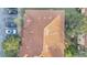 Top-down view of a brown tile roof on a townhouse at 7606 Acklins Rd, Kissimmee, FL 34747
