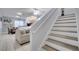 View of the living area from the staircase at 7606 Acklins Rd, Kissimmee, FL 34747