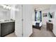 Clean bathroom with granite countertop vanity and shower at 8891 Geneve Ct, Kissimmee, FL 34747