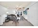Open living area featuring a cozy couch and a flat-screen TV at 8891 Geneve Ct, Kissimmee, FL 34747