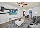 Common area with seating, TV, and access to other rooms at 8891 Geneve Ct, Kissimmee, FL 34747