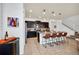 Modern kitchen with dark cabinets, granite counters, and island at 8891 Geneve Ct, Kissimmee, FL 34747