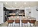Modern kitchen with stainless steel appliances and an island at 8891 Geneve Ct, Kissimmee, FL 34747